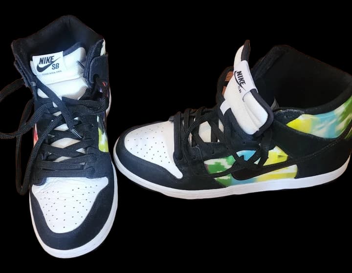 Black and white Nike high-top sneakers with colorful accents